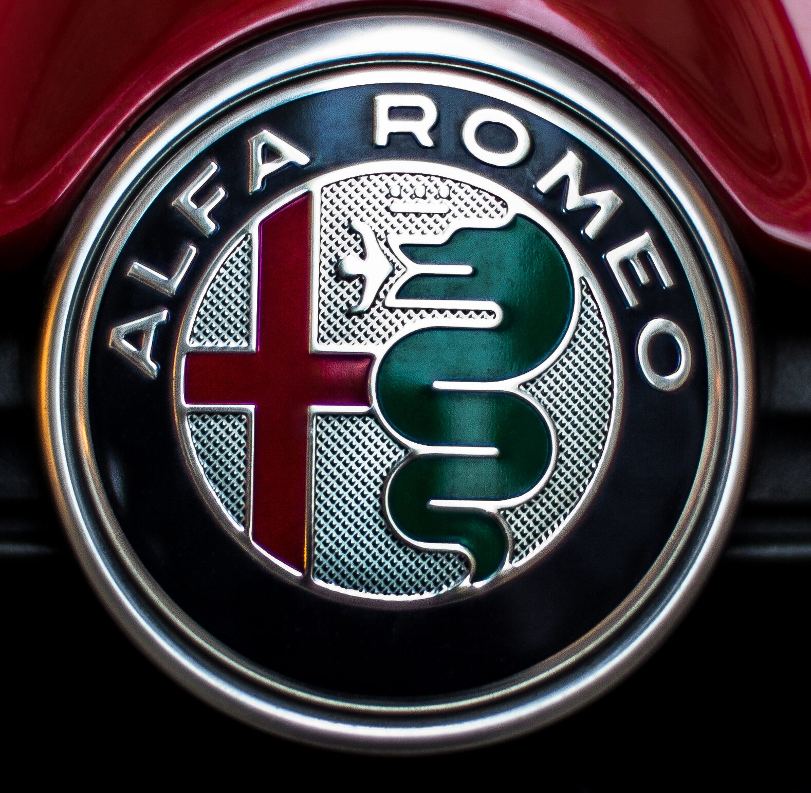 ALFA_ROMEO_badge_on_a_car_cropped e1773133952550